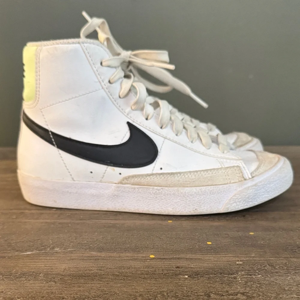 Nike White High-Top Sneakers with Black Swoosh
